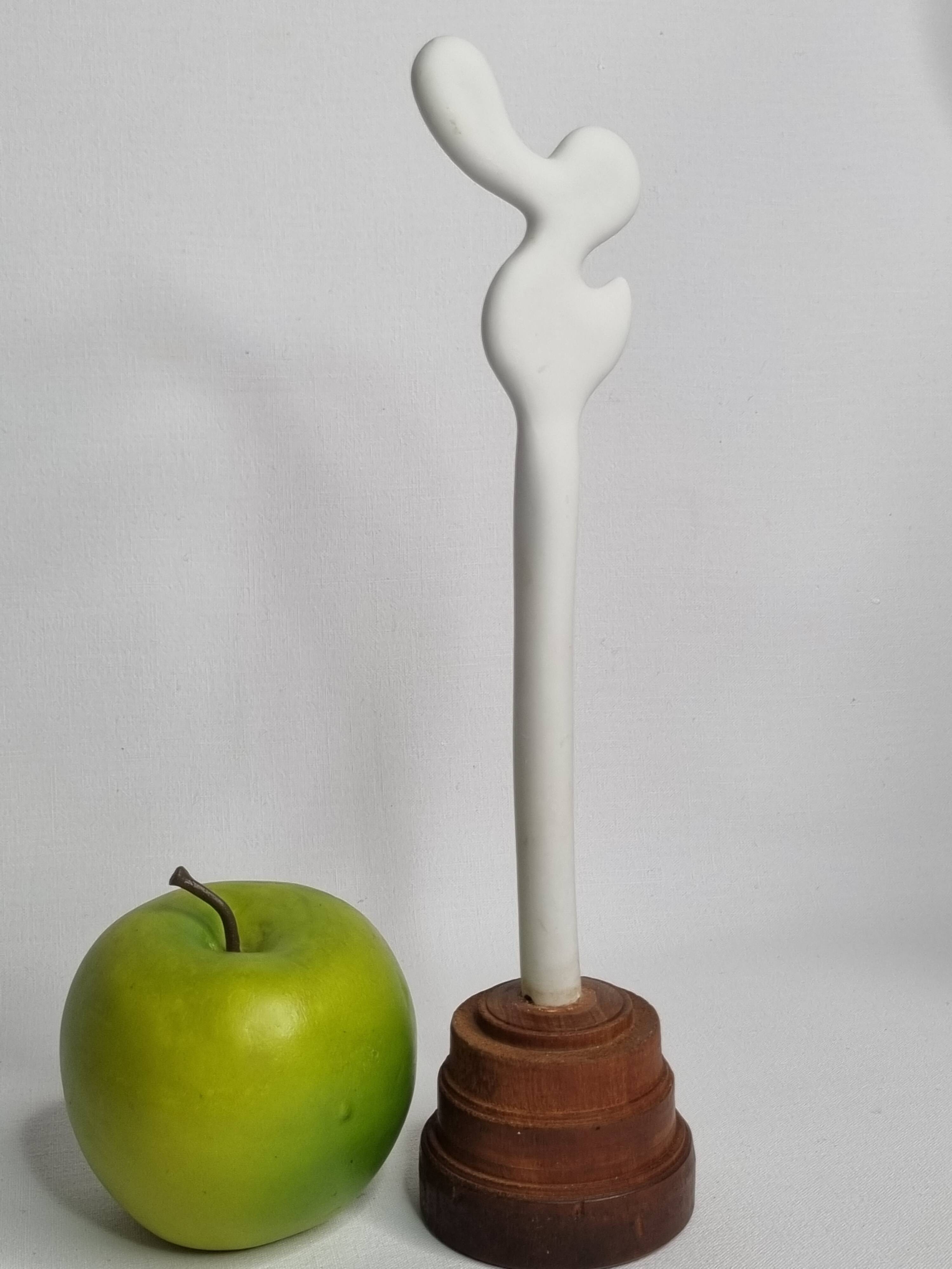 Biomorphic-inspired sculpture, on an industrial wooden base, 28 cm