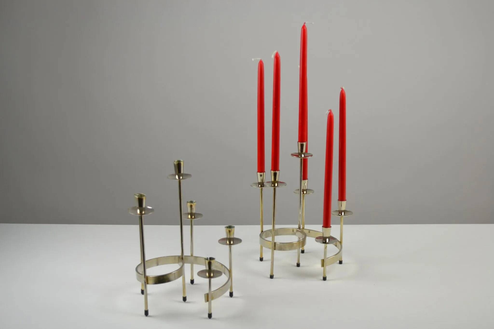Pair of white metal candle holders "Spiral" by Gunnar Ander for Ystad-Metall, Sweden, 1960s.