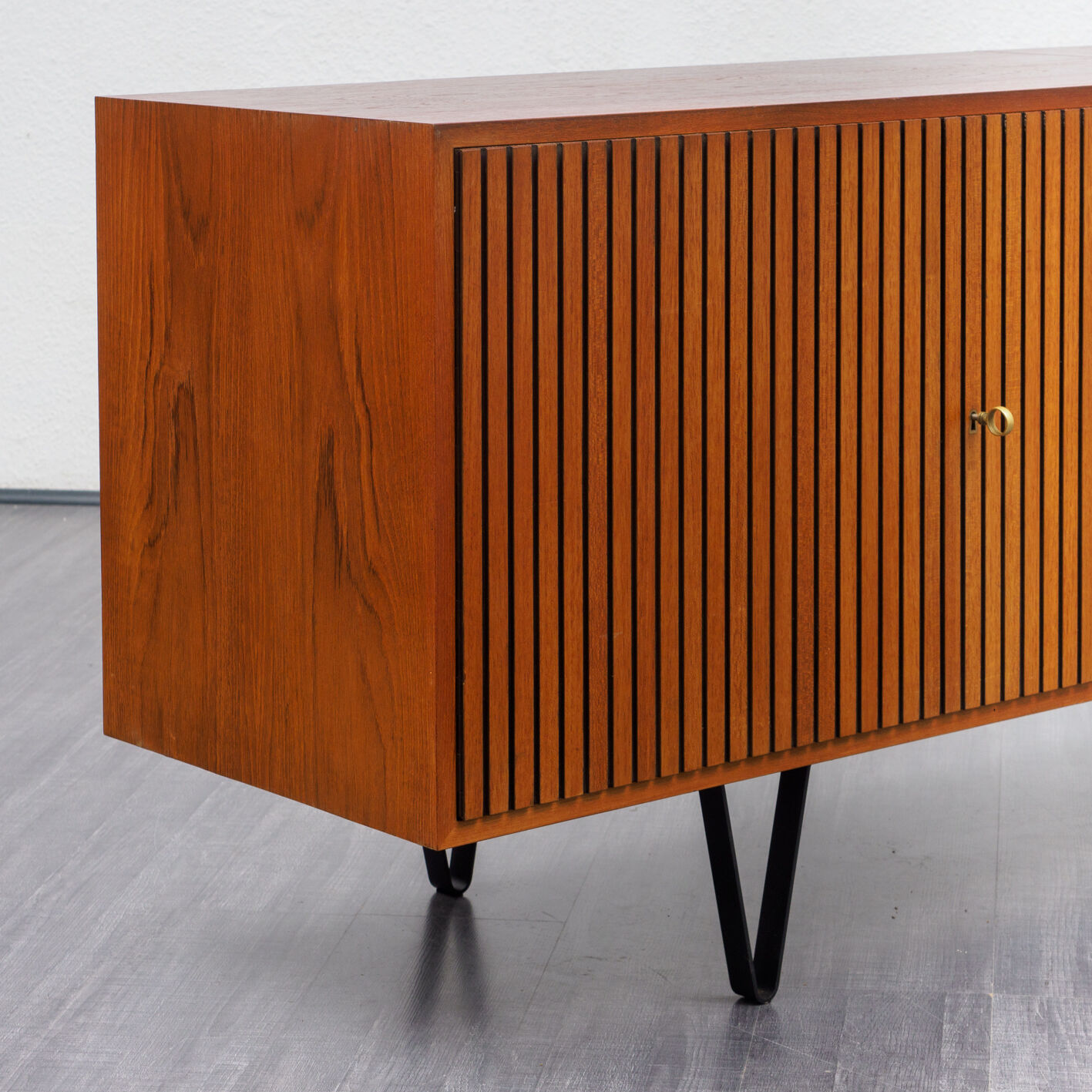 Sideboard 60 years, teak, metal legs, doors striated