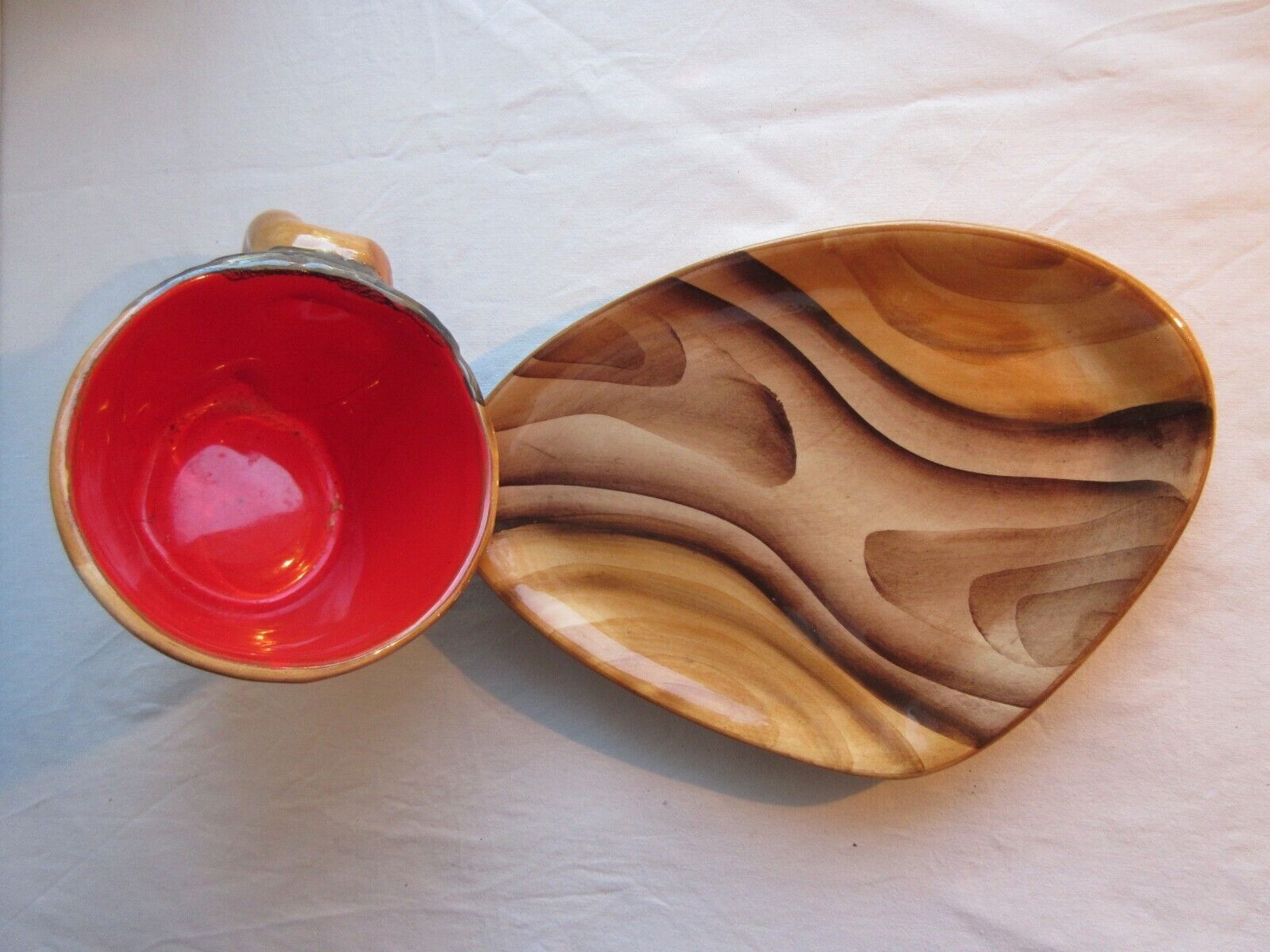 2 lunches decorated in faux wood style, cups + saucers, signed VALLAURIS