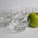 Set of Art Deco style engraved crystal bowls and glasses on spherical feet