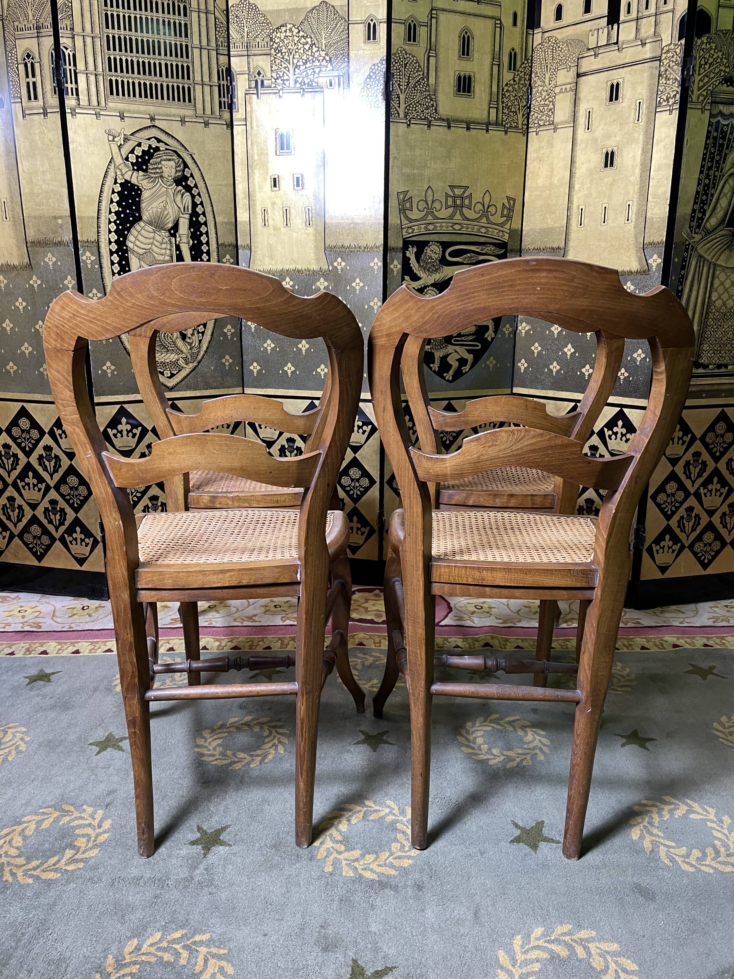 Suite de 4 chaises Louis Philippe en cannage