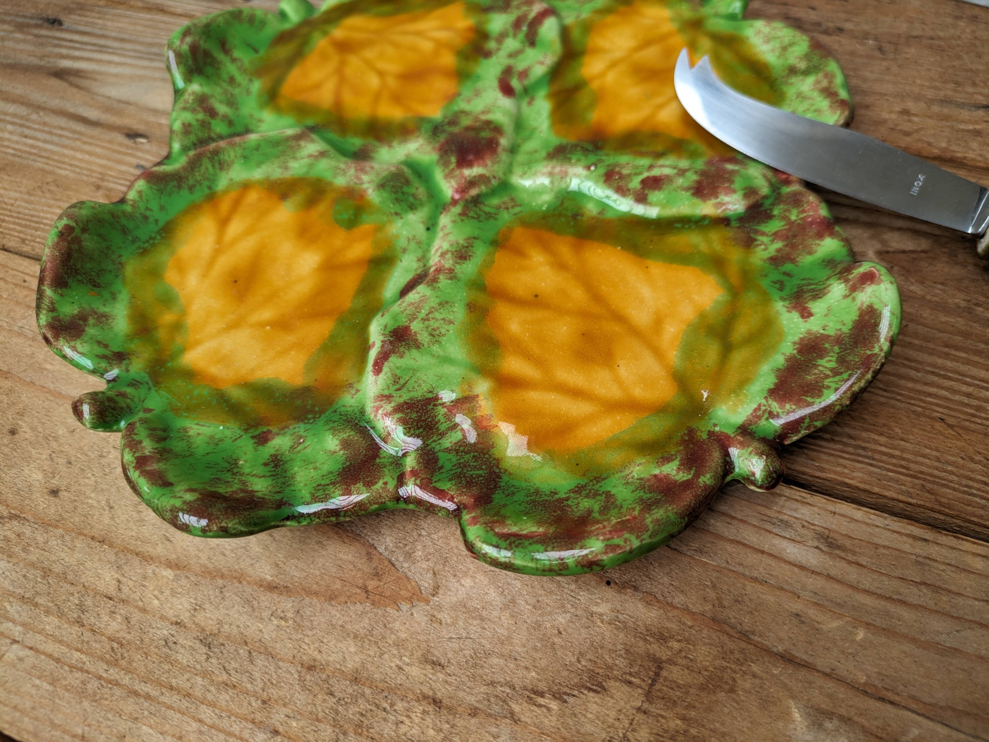 Antique colored ceramic cheese plate with knife