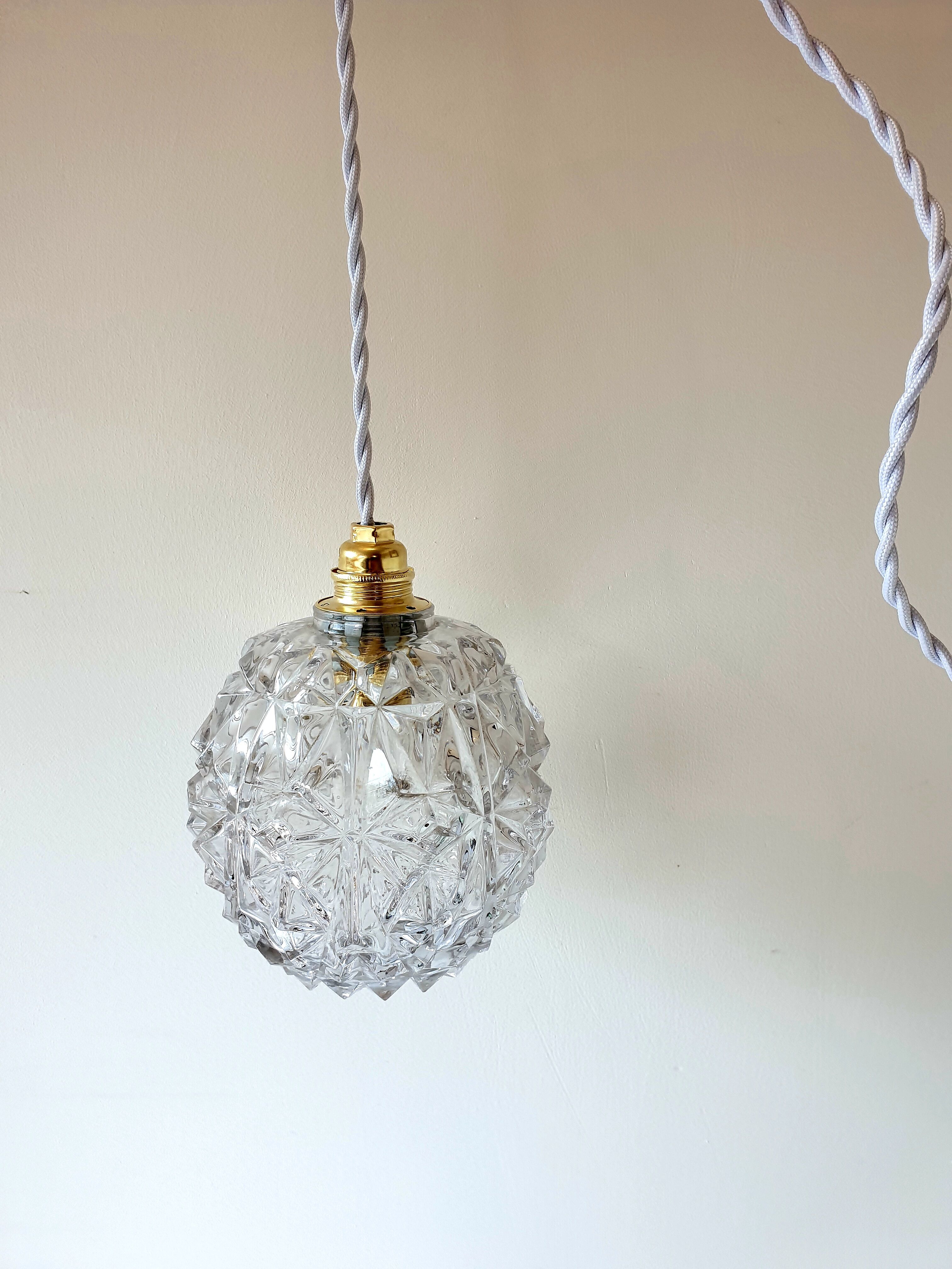 Balladeuse boule en verre ciselé