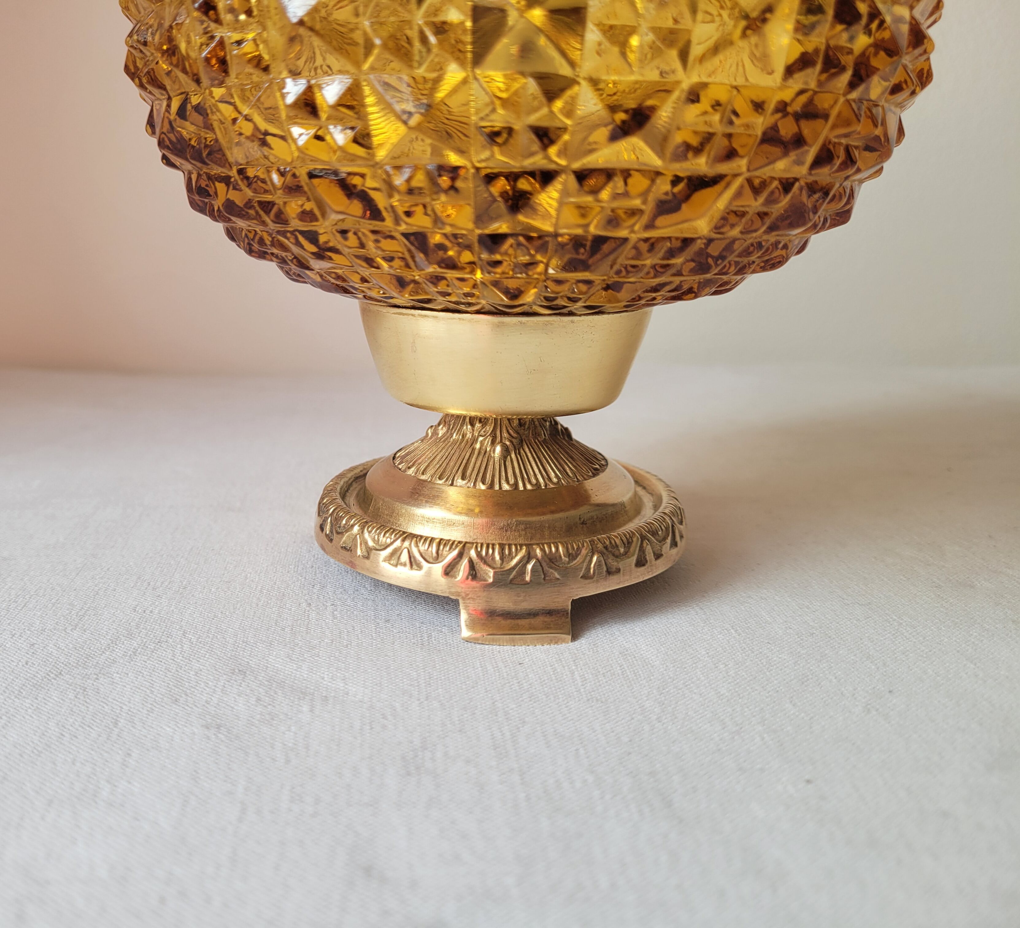 Bedside lamp in amber glass and brass