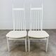2 Scandinavian slatted chairs, white, from the 1960s.