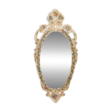 Vintage mid-century wall mirror with plaster flower decoration.