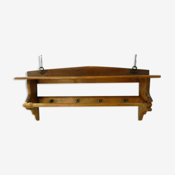 Wooden shelf with hooks and towel holders