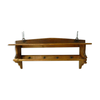 Wooden shelf with hooks and towel holders