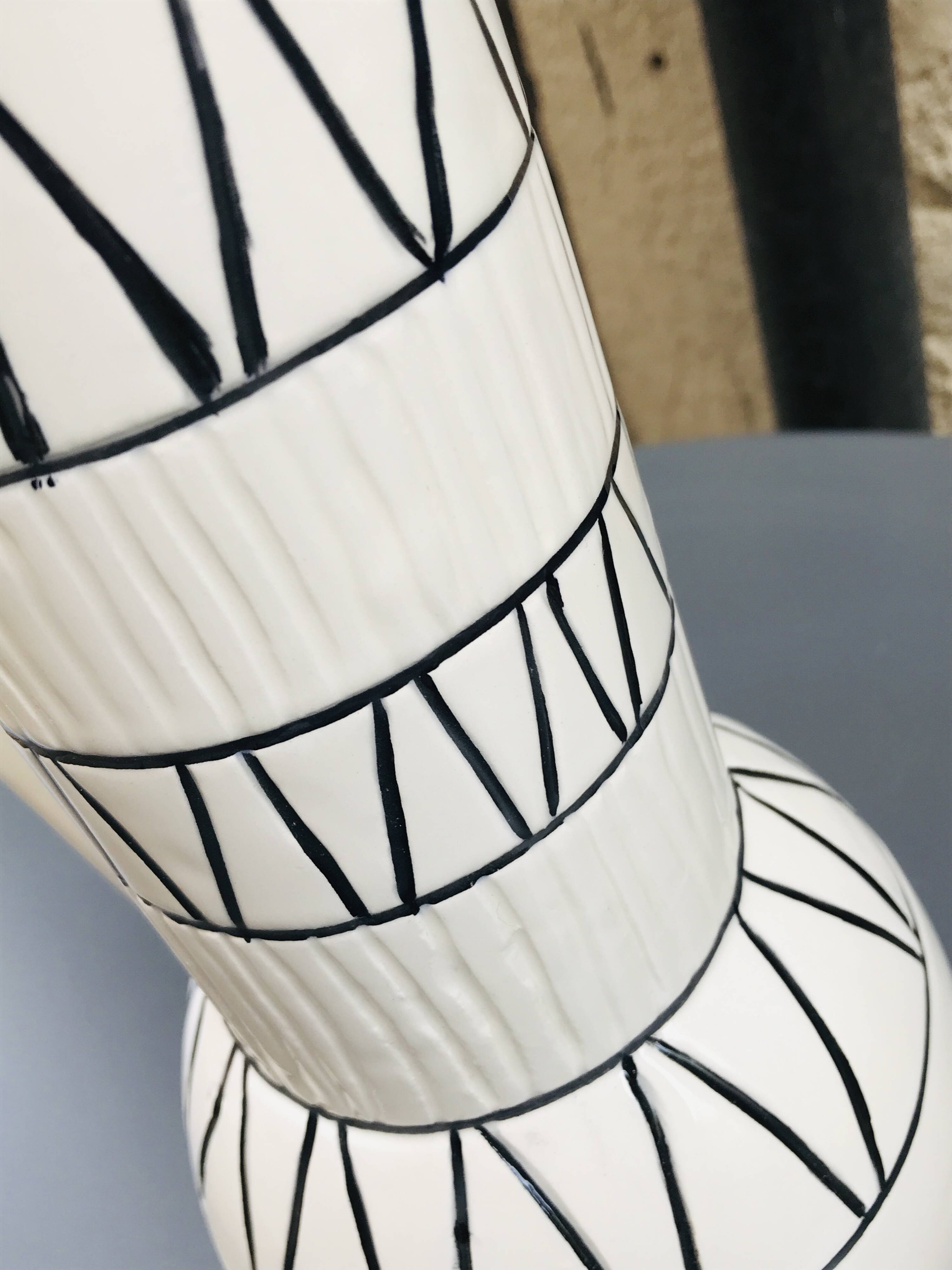 Vase with geometric pattern handles