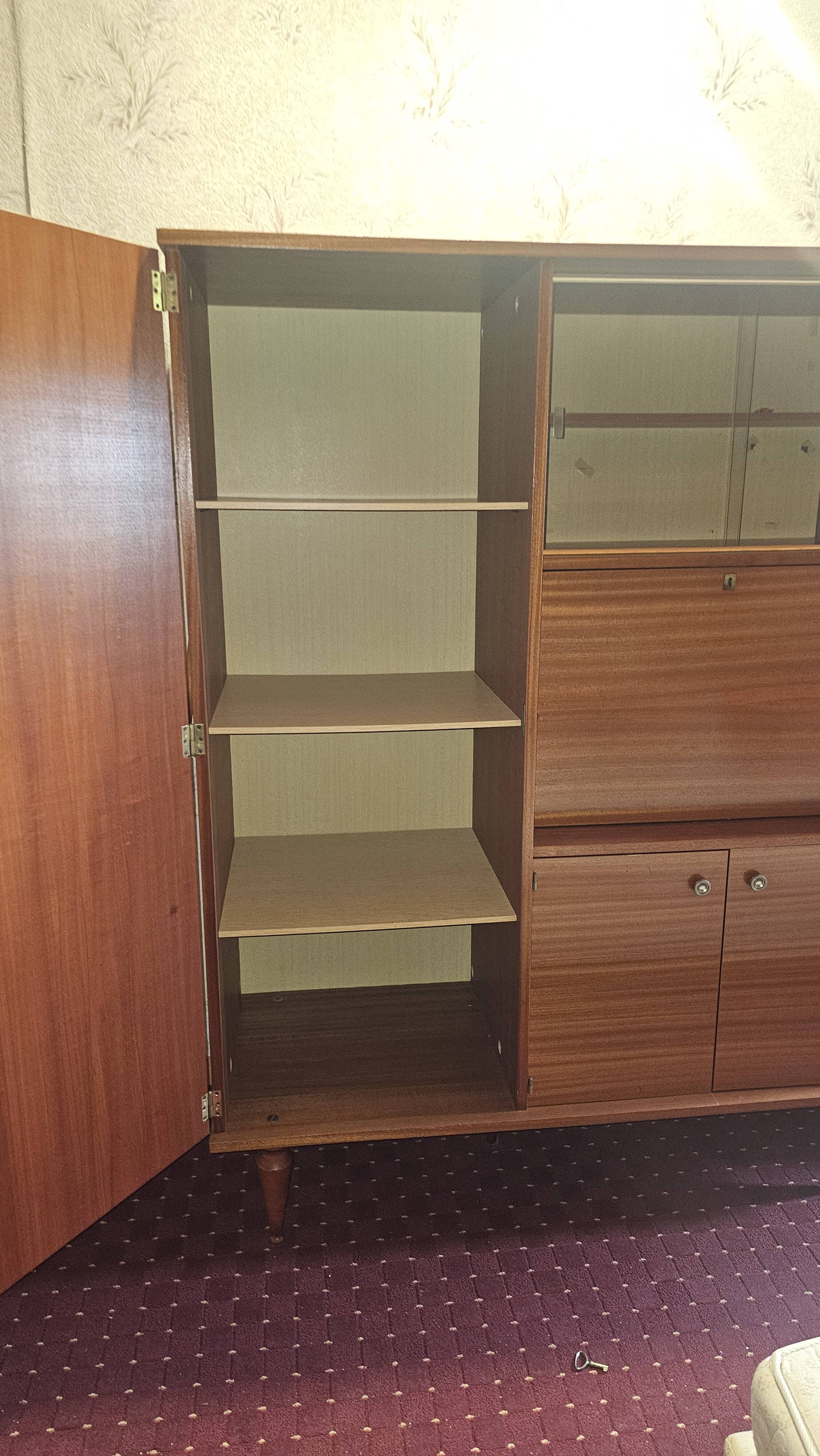 1960s teak veneer secretary with sliding display cabinet.