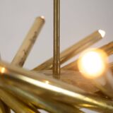 Pair of matte gold-plated brass chandeliers. Italian work from the 1970s.