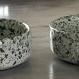 2 green speckled ramekins.