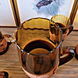 Orangeade set with pitcher and 6 amber glass glasses with "woven" fabric surround