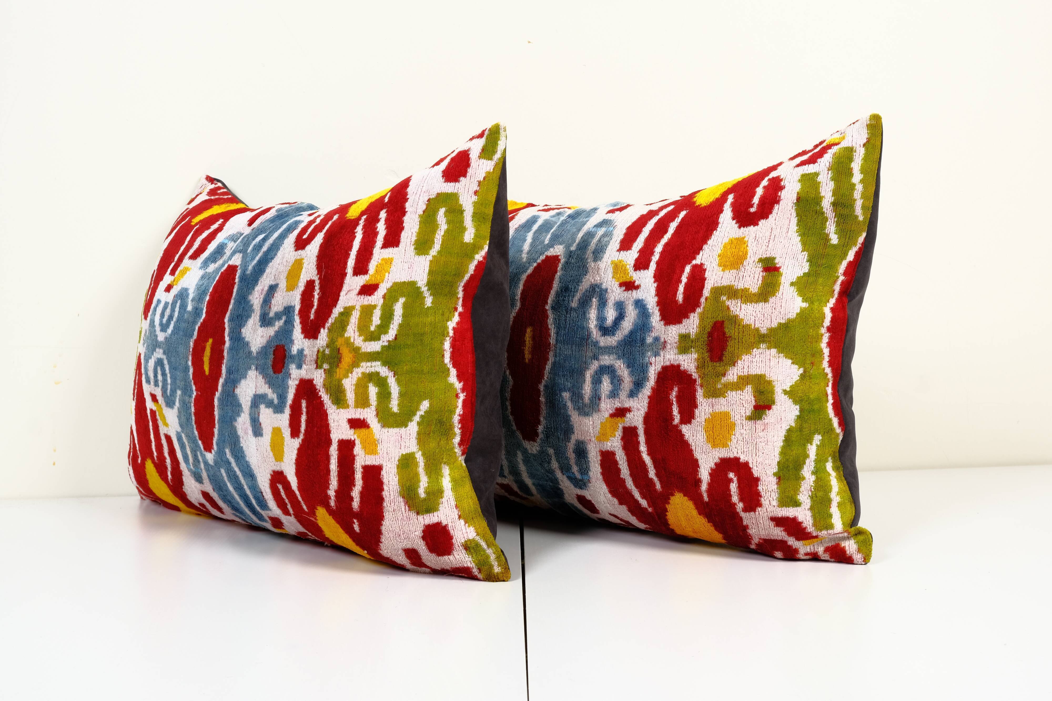 Set of two yellow ikat velvet pillows