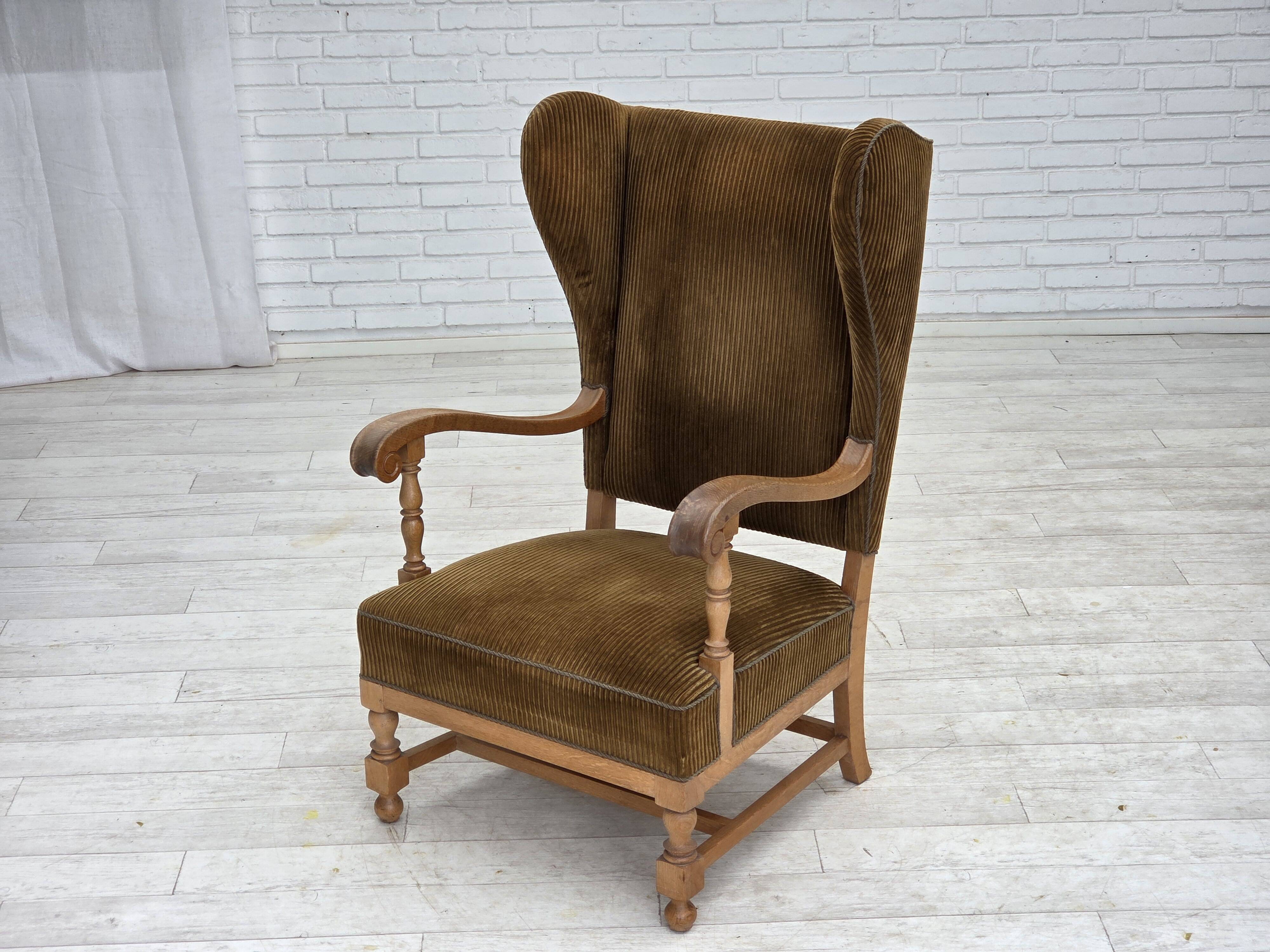 1970s, Scandinavian highback armchair, furniture corduroy, carved oak wood.
