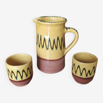 Ceramic carafe and two matching ceramic cups