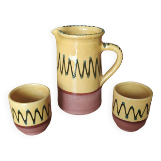 Ceramic carafe and two matching ceramic cups