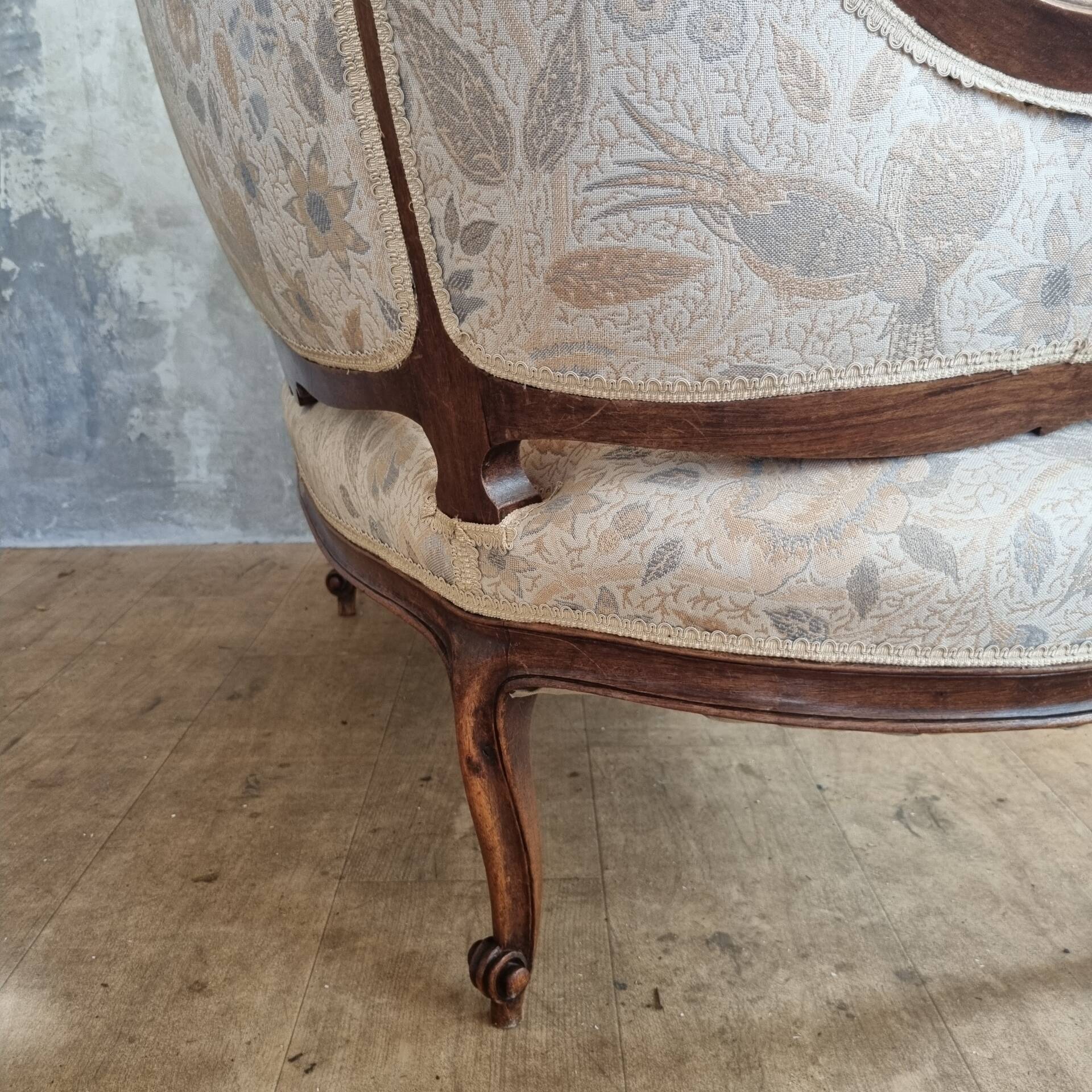 Small sofa or bench in Louis XV style, rococo.