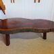 Tripod coffee table - solid okoumé wood - organic shape - brutalist style