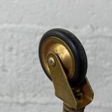 Small rolling trolley in brass and black plastic