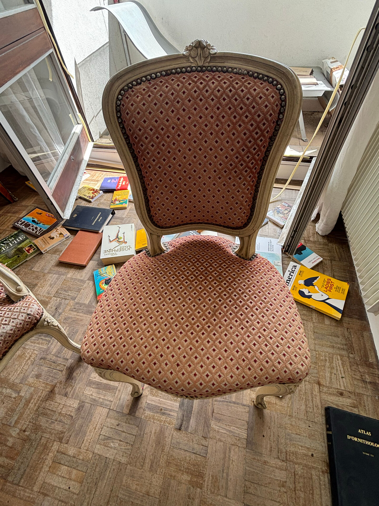 Louis XV style chair in patinated wood, fully upholstered in a fabric.