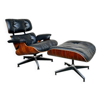 Lounge chair and ottoman by Herman Miller Charles & Ray Eames, rosewood.