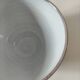 Glazed earthenware bowl, Millian pottery, France, stylised floral decoration.