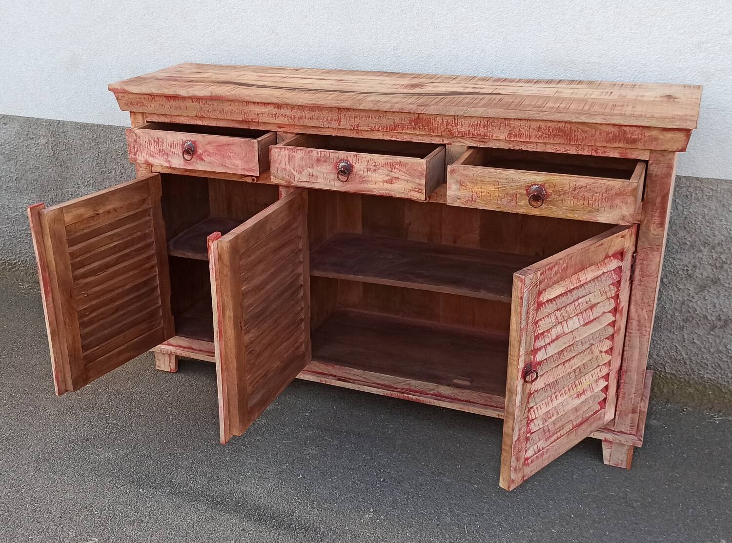 Wooden sideboard with red highlights