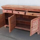 Wooden sideboard with red highlights
