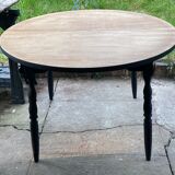 Table en bois ronde avec rallonge intégrée