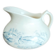 Old bulbous jug in ironstone earthenware