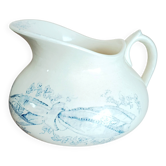Old bulbous jug in ironstone earthenware