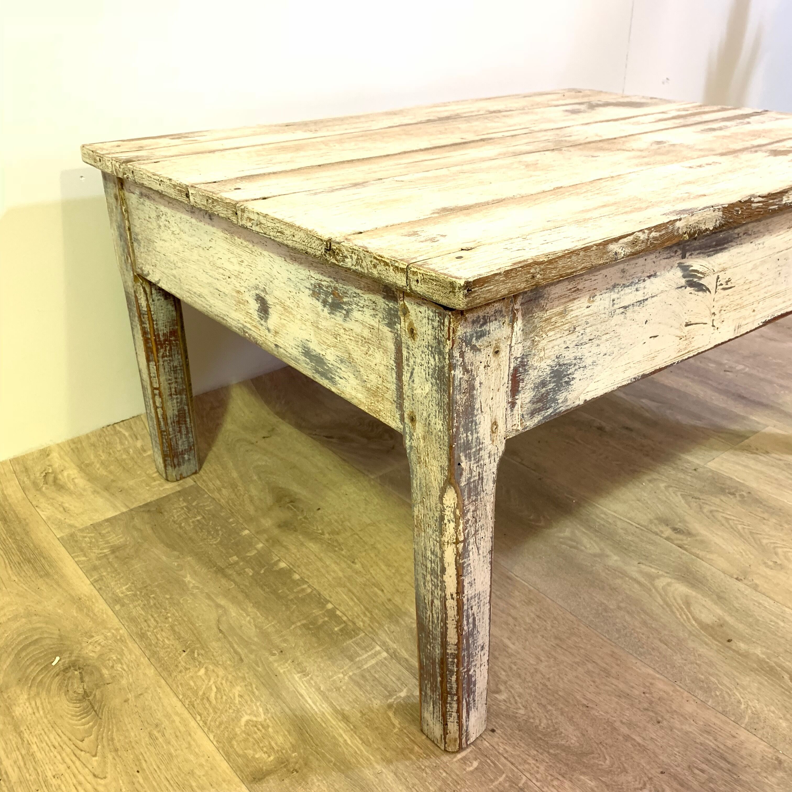 White patinated wooden coffee table