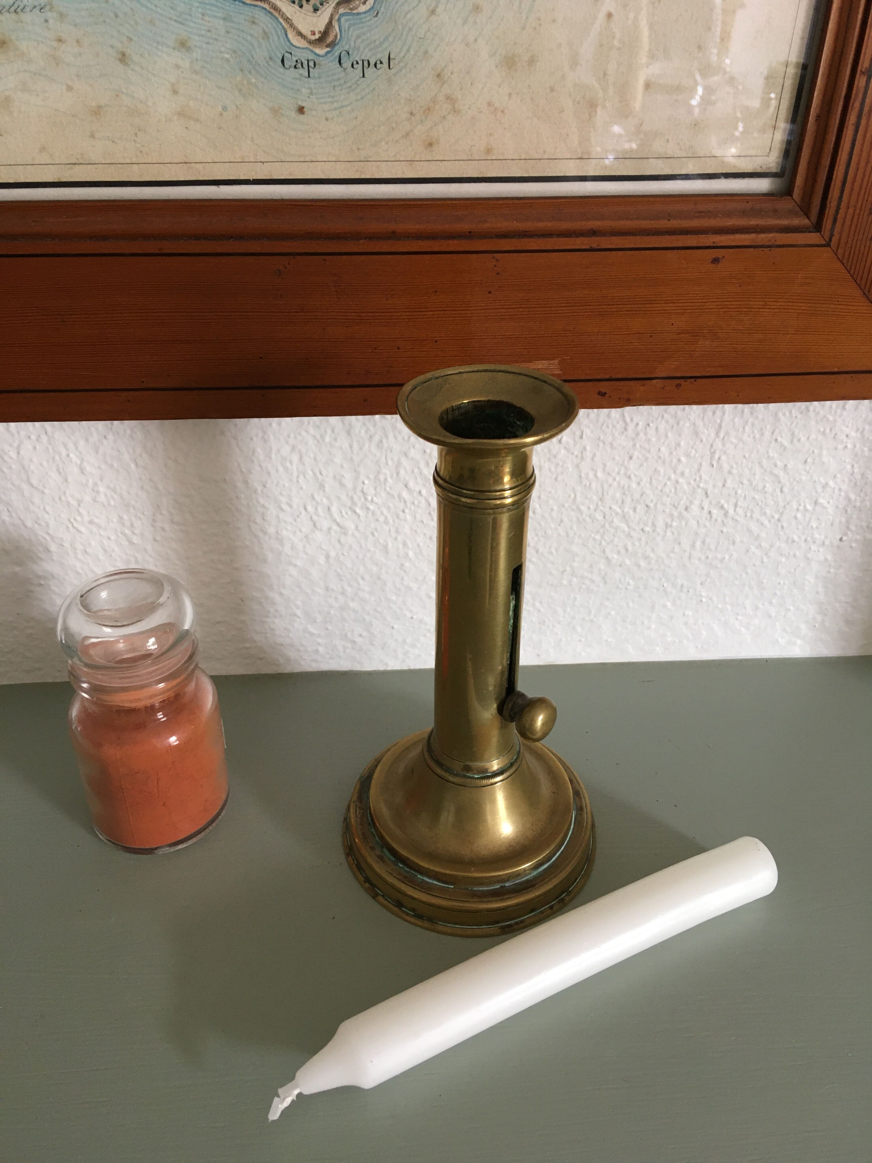 Brass pusher candle holder