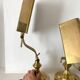 Pair of notary-style lamps in gilded metal