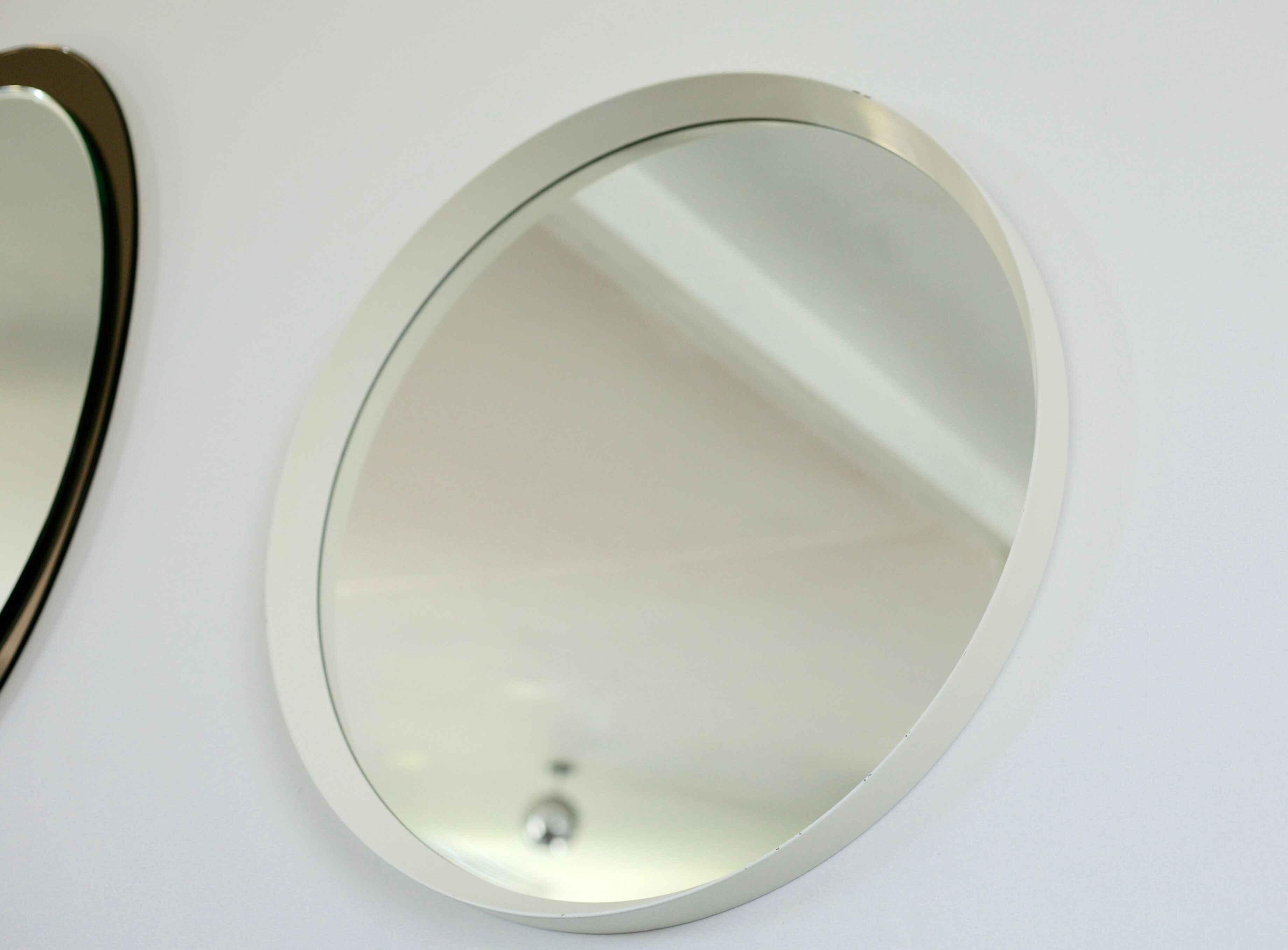 Circular mirror in "cream" laqué wood France circa 1960 68cm