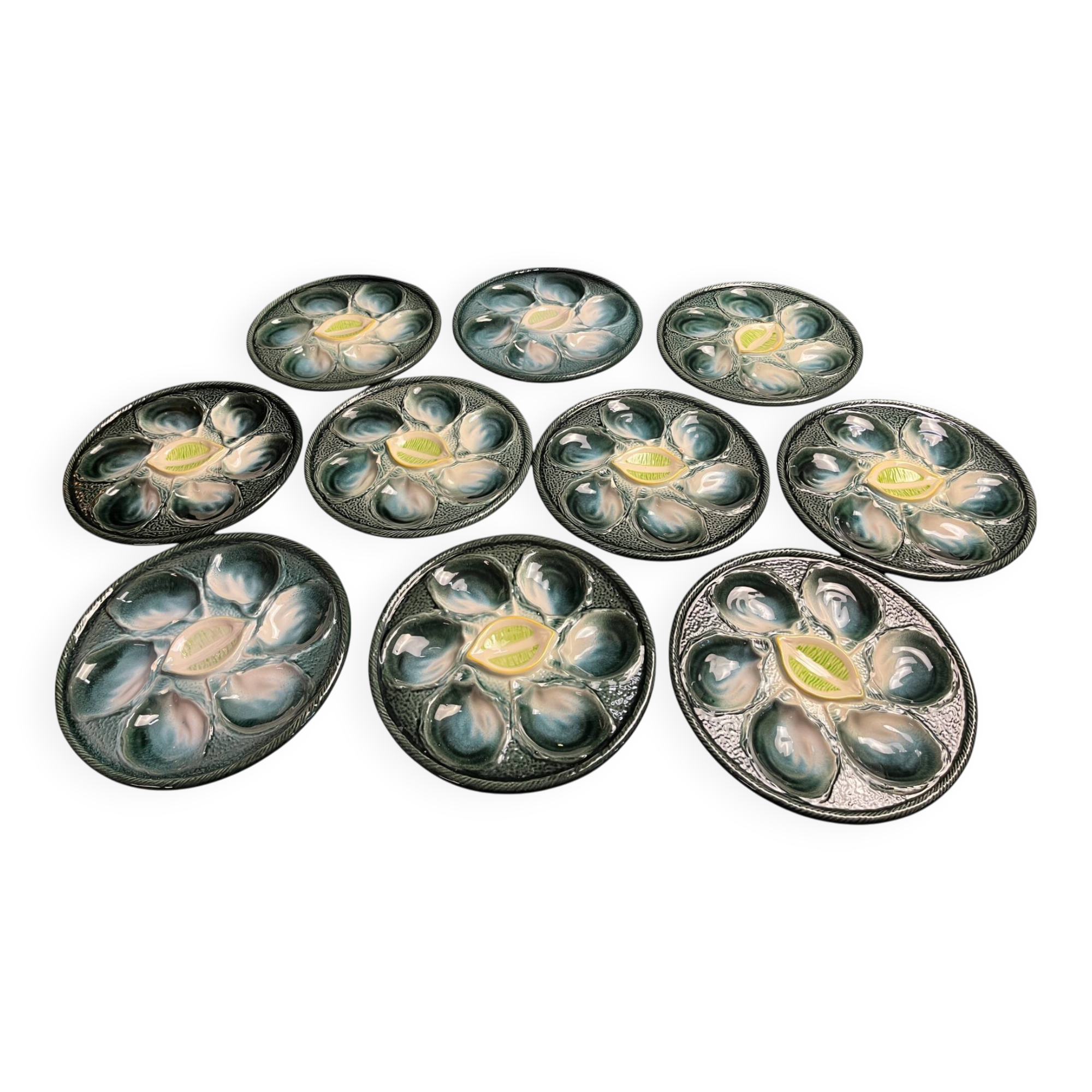 Série 10 assiettes à huitres barbotine Saint Clément vers 1940