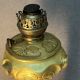 Beautiful and old oil lamp in gilded bronze, attributed to Georges Leleu