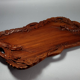 Ancient wooden tray carved with Chinese dragons around 1900
