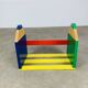 Wall-mounted pencil shelf for children, Pierre Sala style.