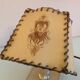 Brass bedside lamp and beige lampshade art deco style