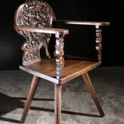 17th century Alpine carved walnut Brettstuhl armchair with grotesque mask
