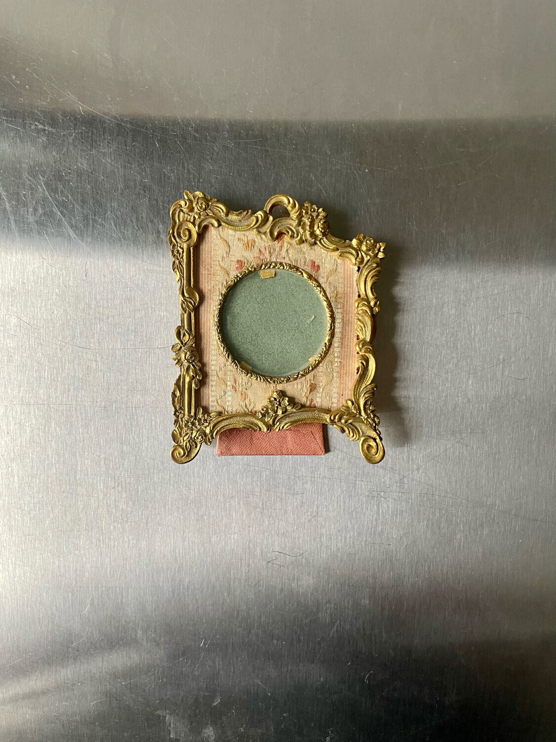 Metal gold colored picture frame brass