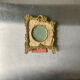 Metal gold colored picture frame brass