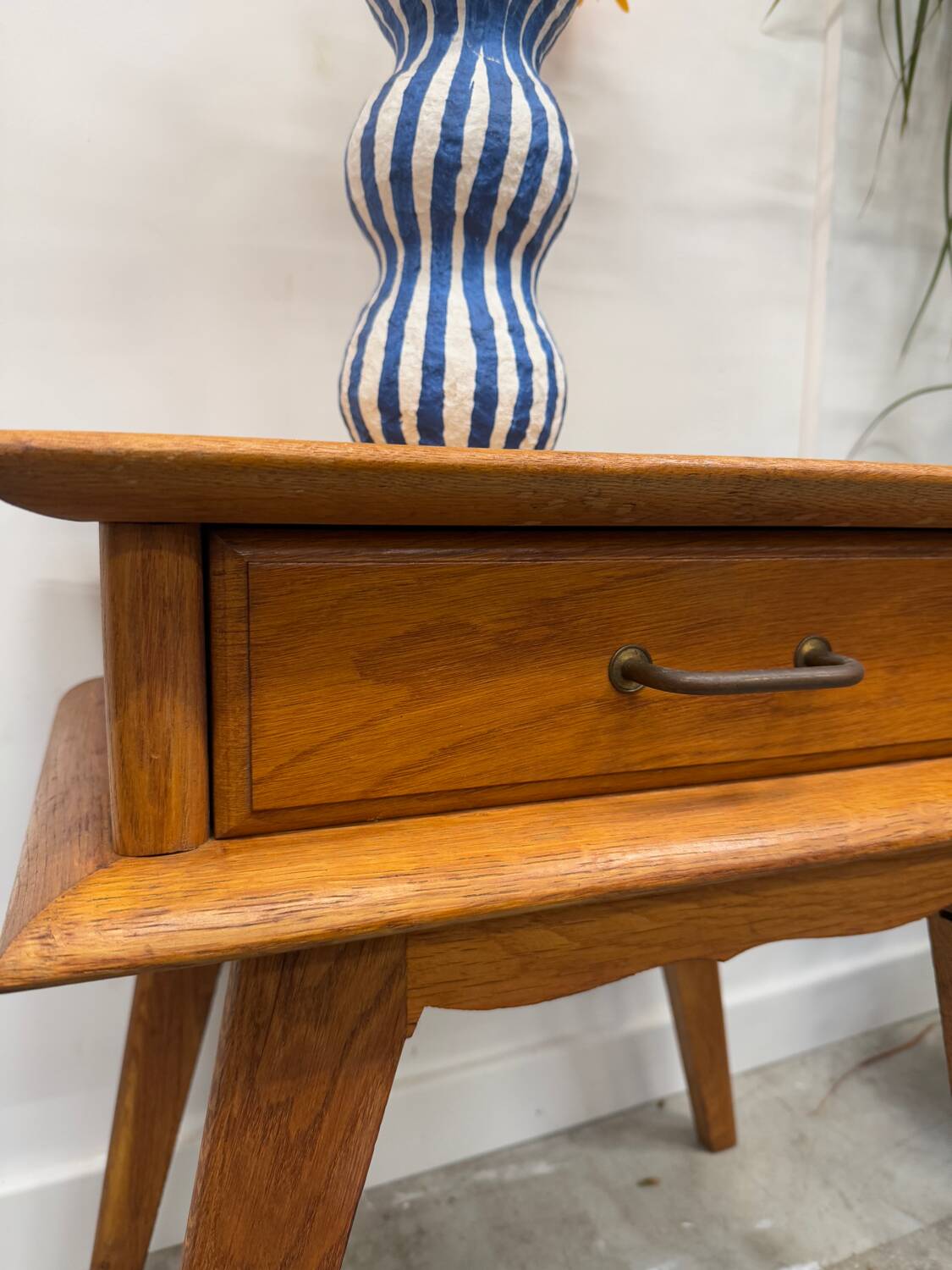Bedside table with compass feet