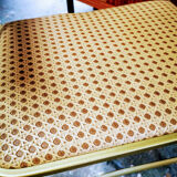 Folding gold arm chair