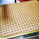 Chaise à bras dorée pliante