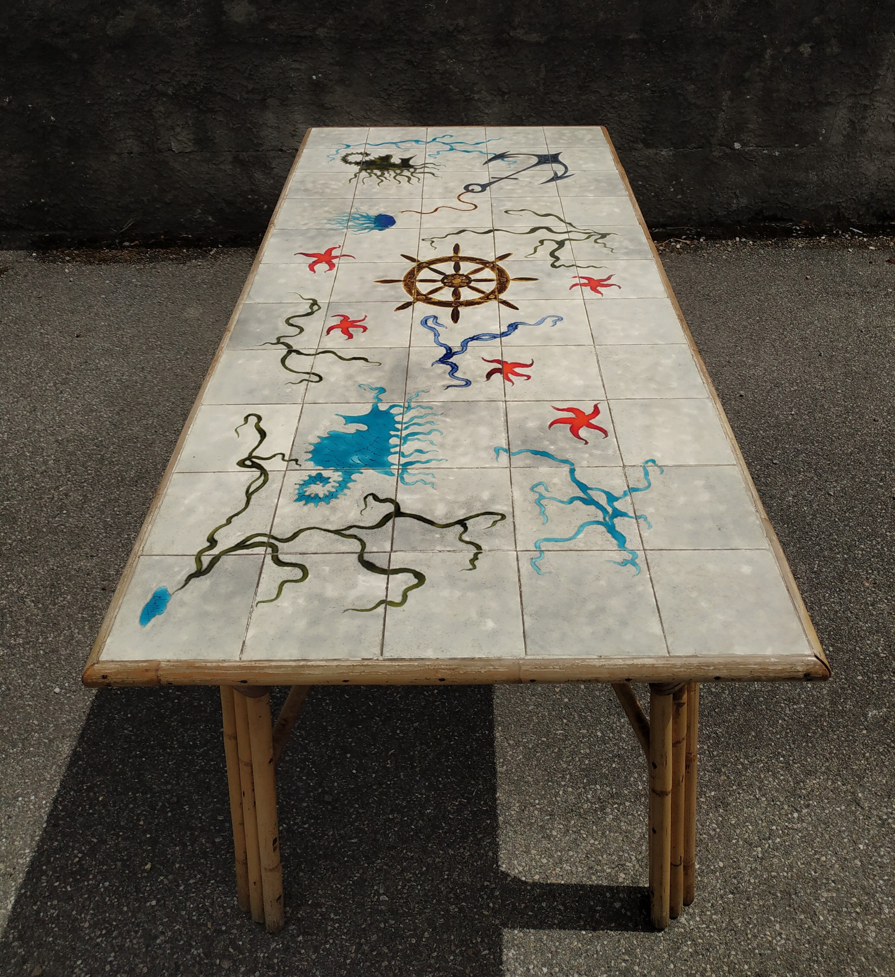 Vintage table in rattan Audoux and Minnet and ceramics Chassin 1950