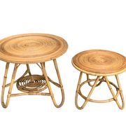 Pair of tripod coffee tables in rattan from the 1950s.